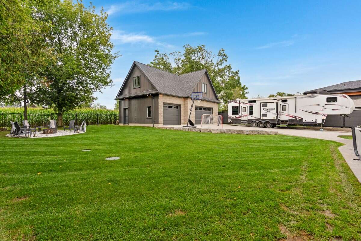 Custom Home. Heated Shop. Quiet lot. Easy Commute