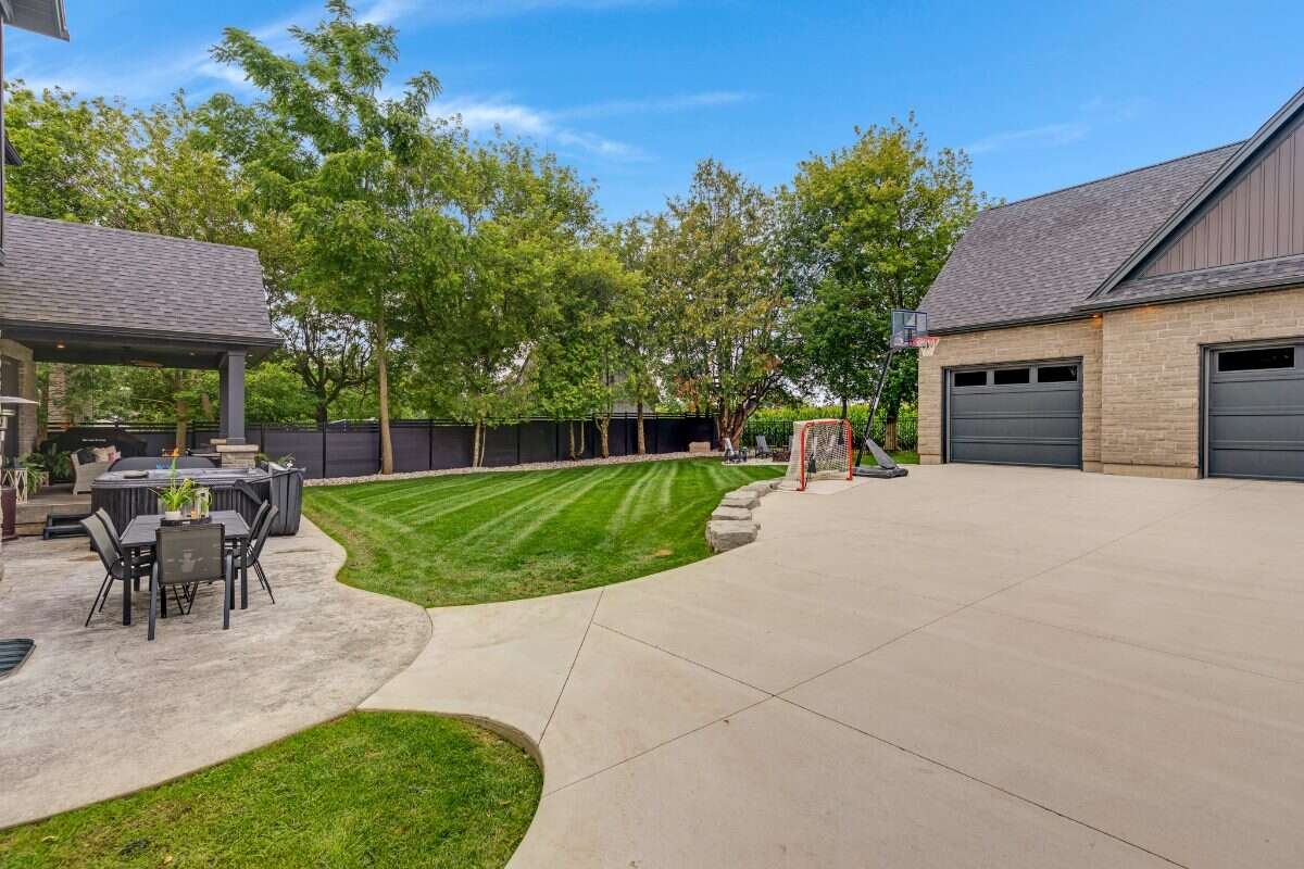 Custom Home. Heated Shop. Quiet lot. Easy Commute
