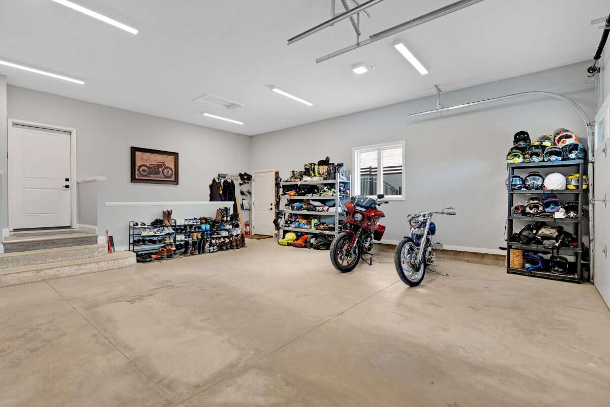 Custom Home. Heated Shop. Quiet lot. Easy Commute