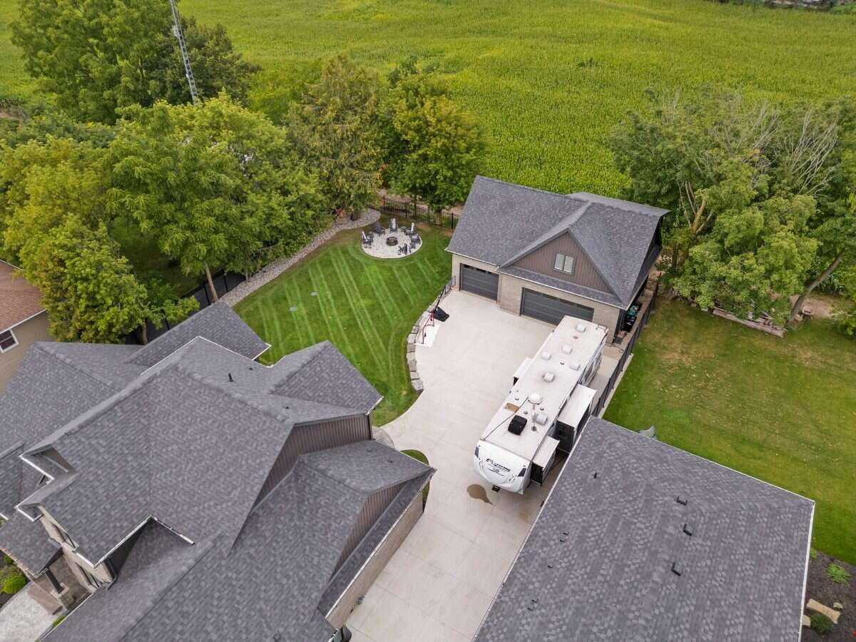 Custom Home. Heated Shop. Quiet lot. Easy Commute