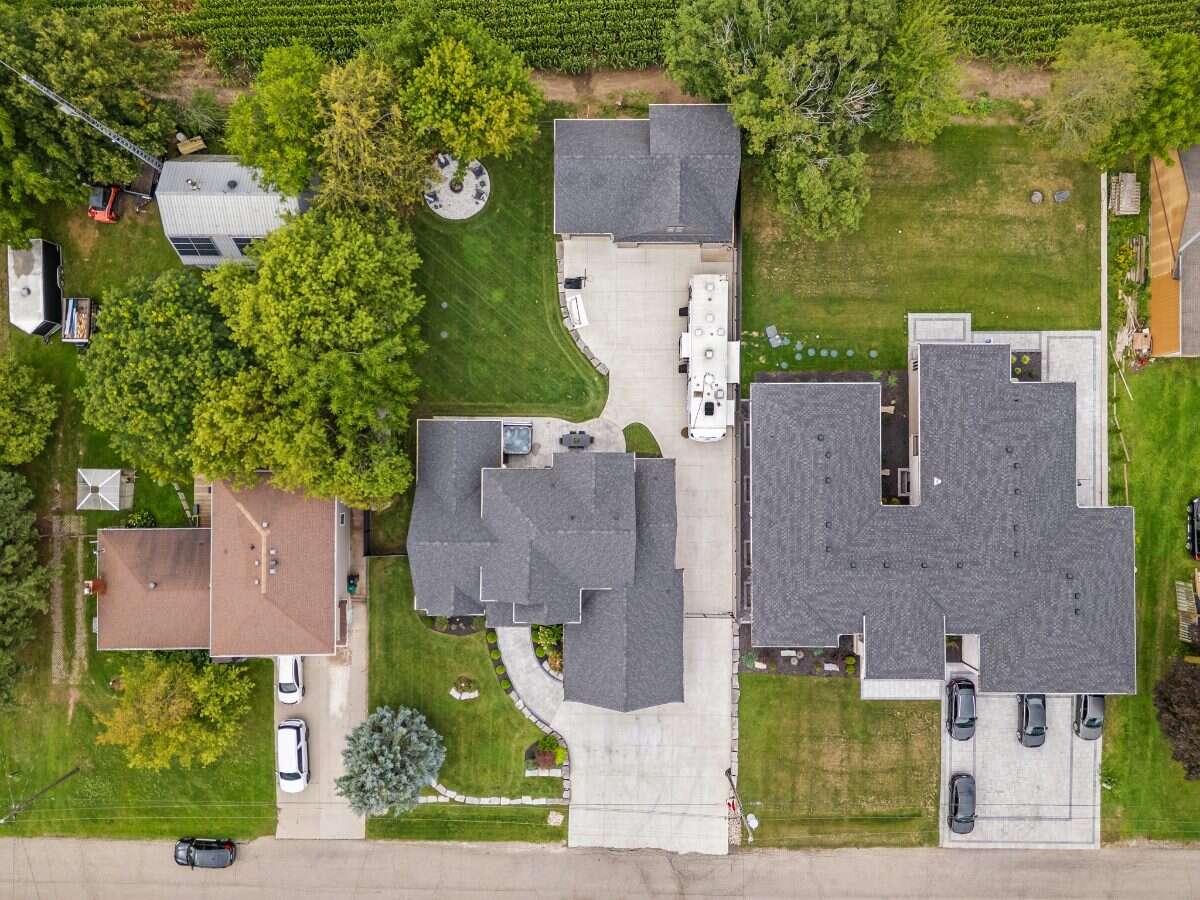 Custom Home. Heated Shop. Quiet lot. Easy Commute