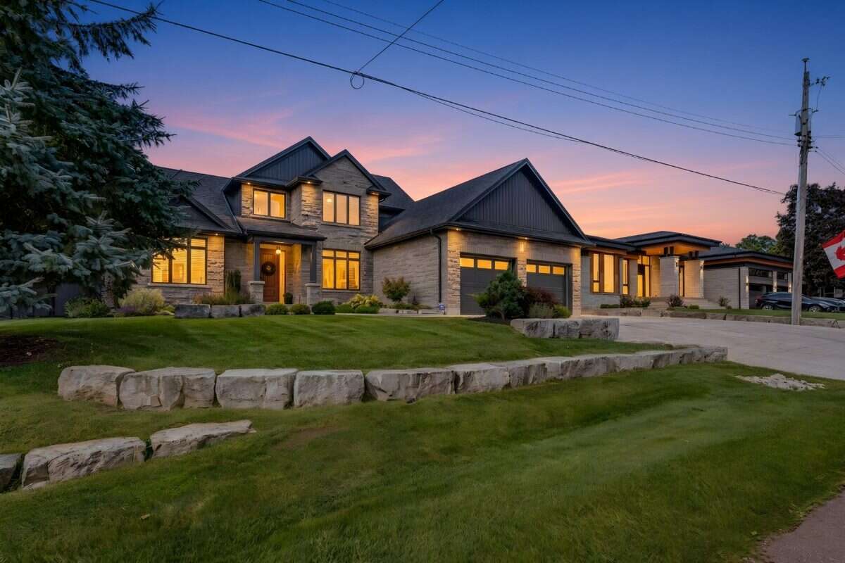 Custom Home. Heated Shop. Quiet lot. Easy Commute