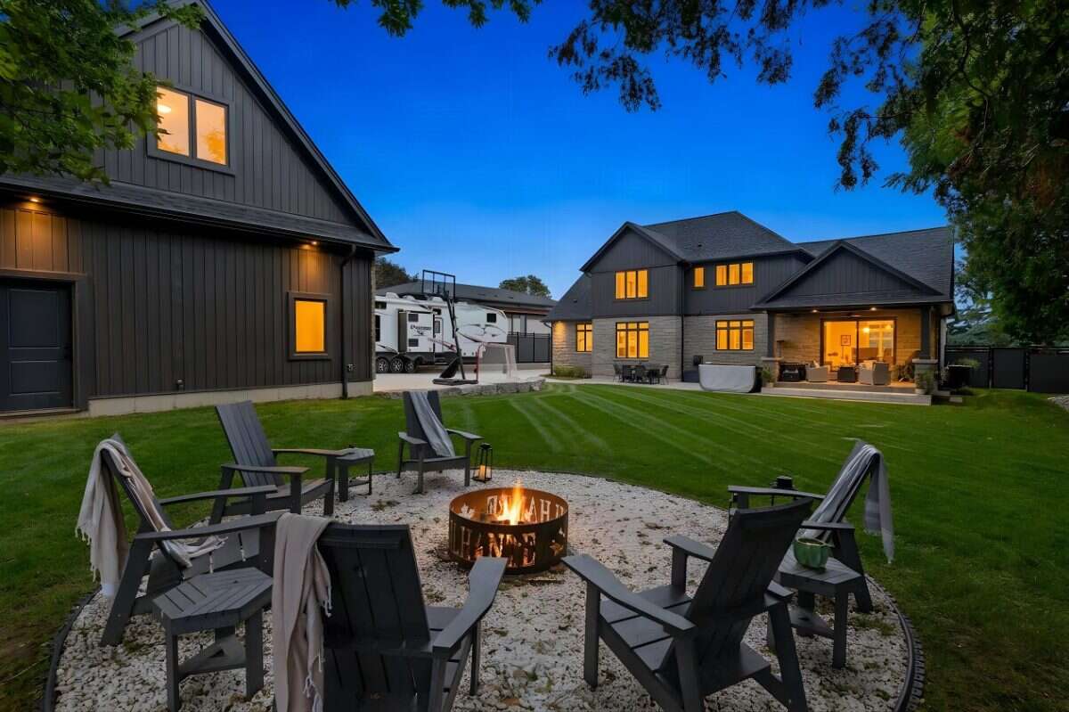 Custom Home. Heated Shop. Quiet lot. Easy Commute