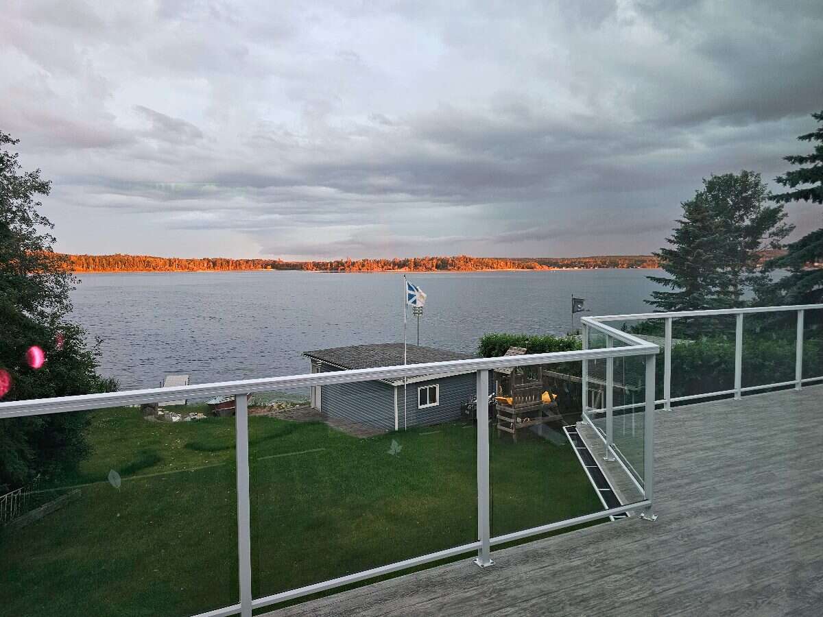 Wake up to lake views, unwind in privacy, and live