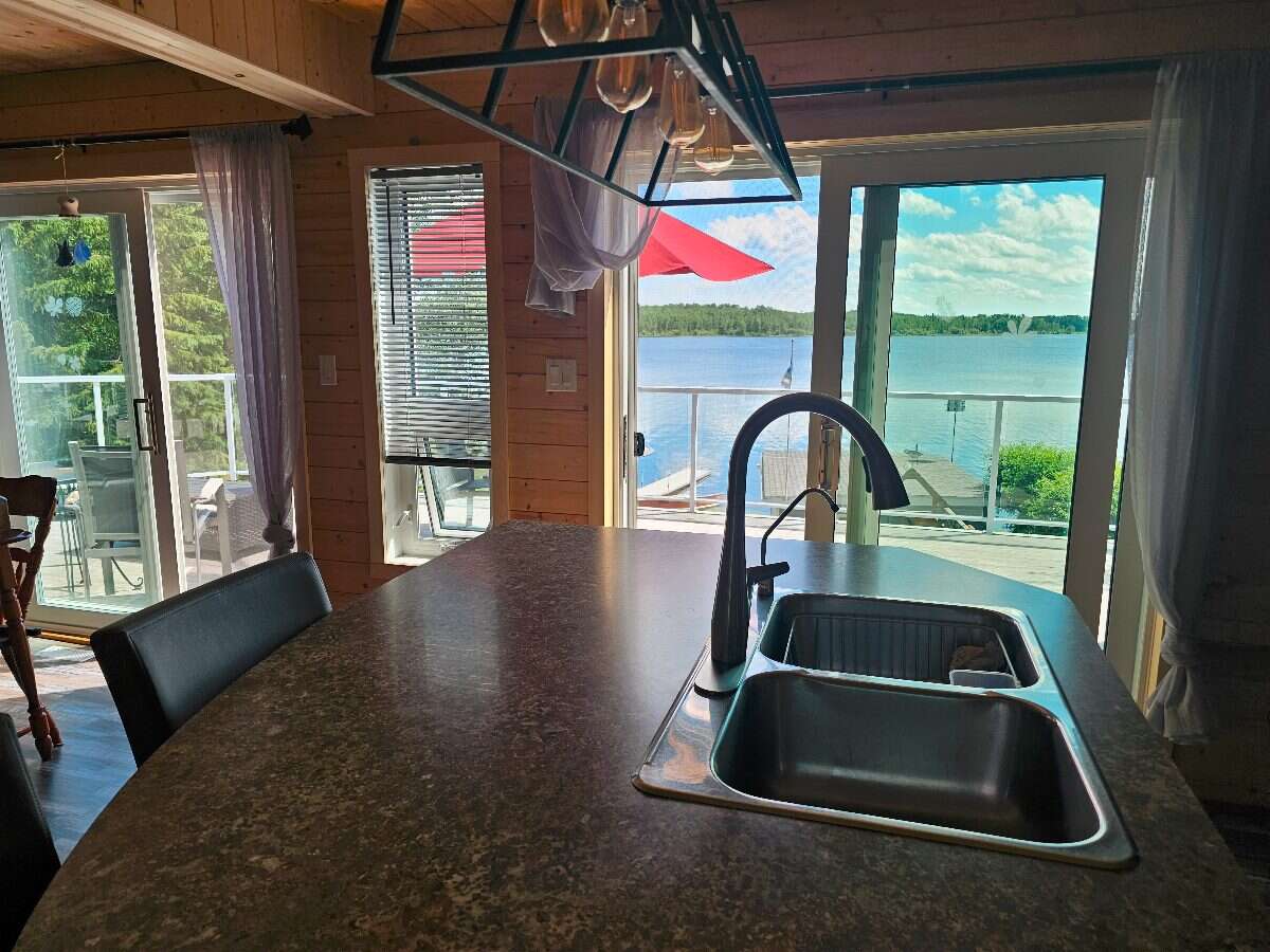 Wake up to lake views, unwind in privacy, and live