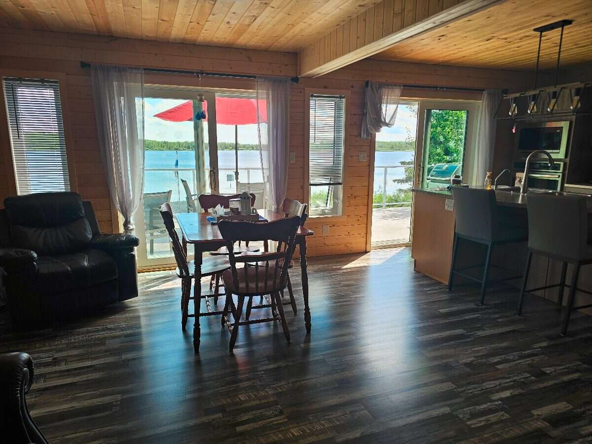 Wake up to lake views, unwind in privacy, and live