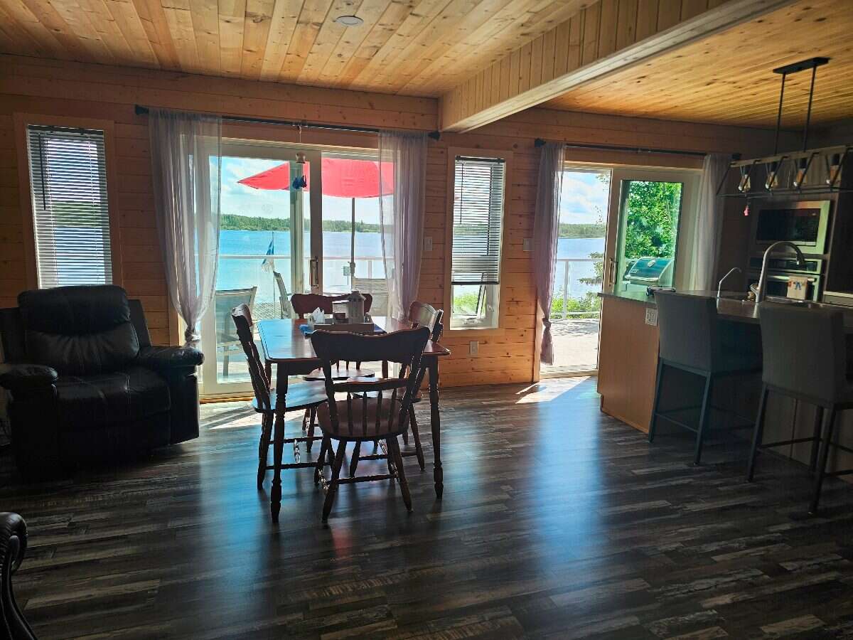 Wake up to lake views, unwind in privacy, and live
