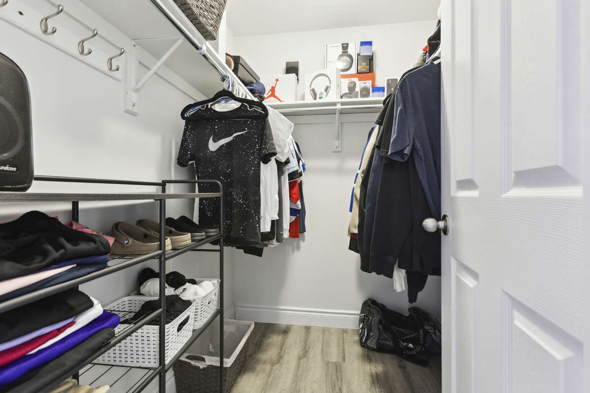Large walk in closet for basement bedroom