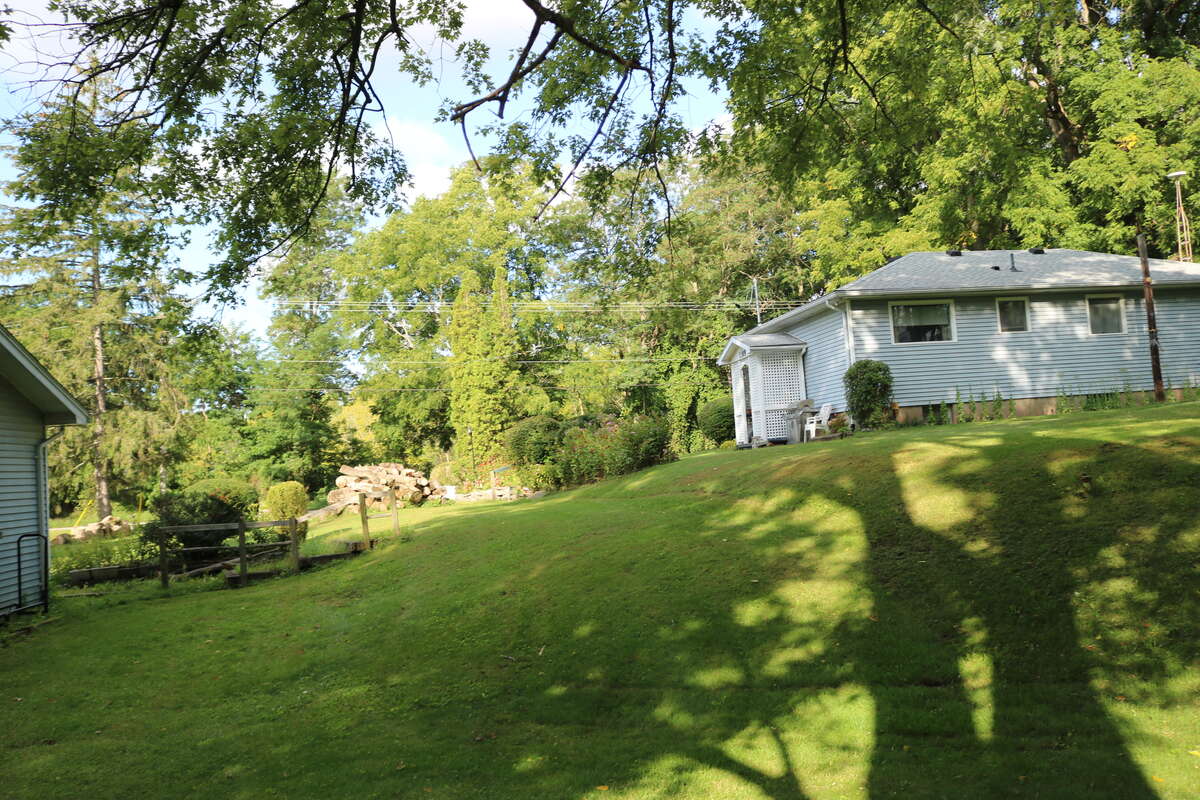 2022 backside of the house & corner of the garage view