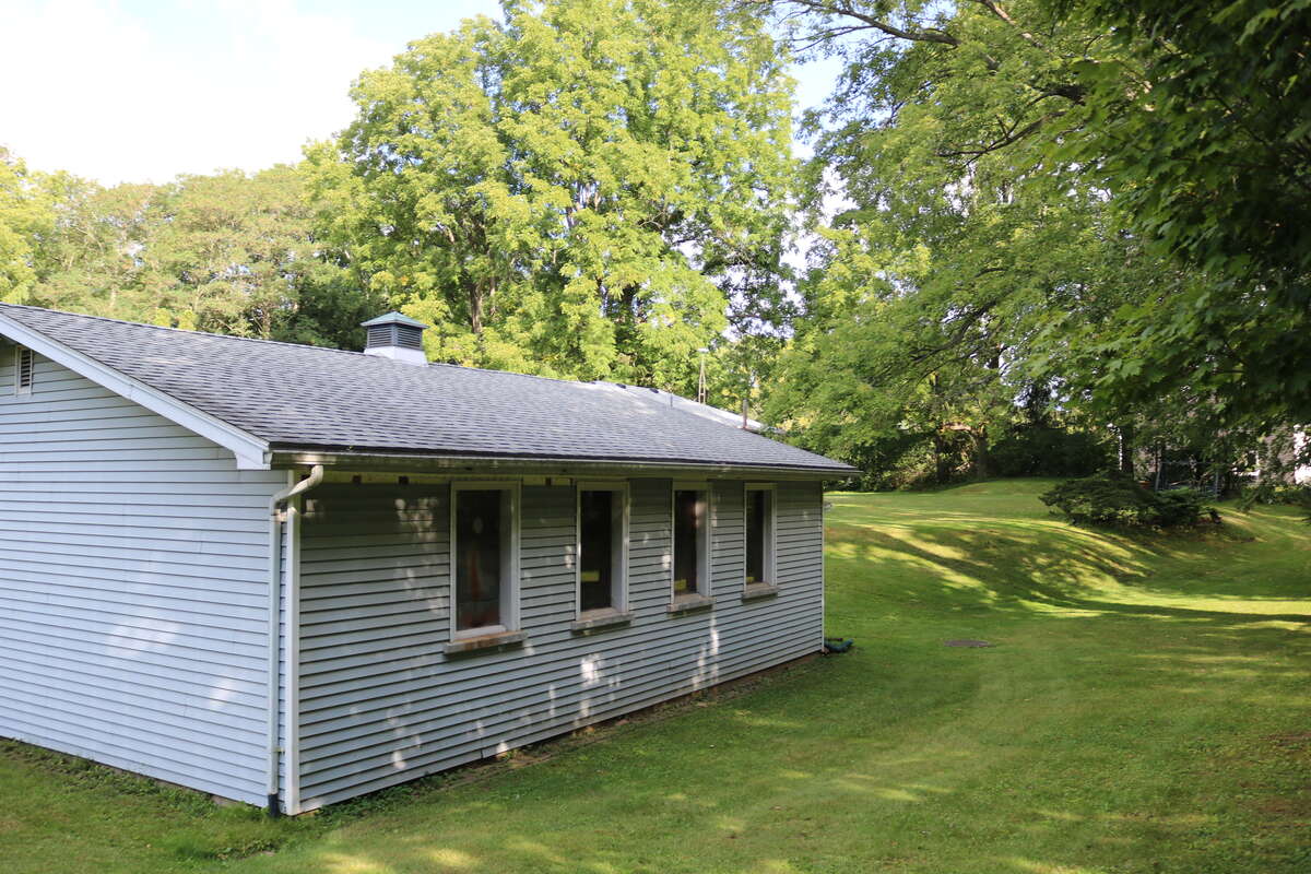 2022 backside of the garage view (a 4-500 sq feet garden was initiated besides the garage in 2024)