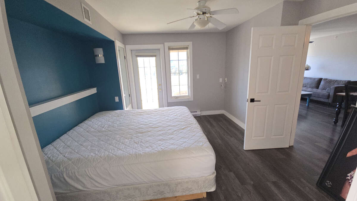 King Size Bed & Exit to Patio or Living Room