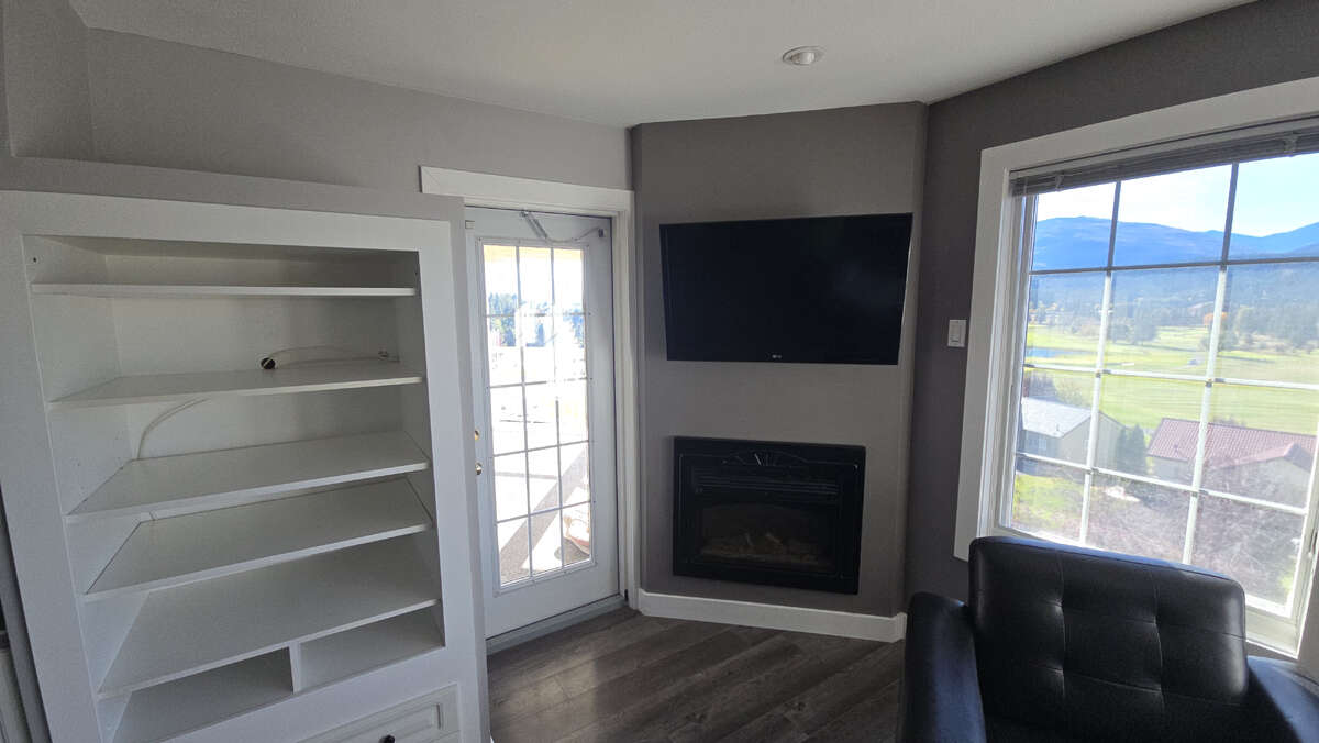 Fireplace, Media and TV with Patio Enrance