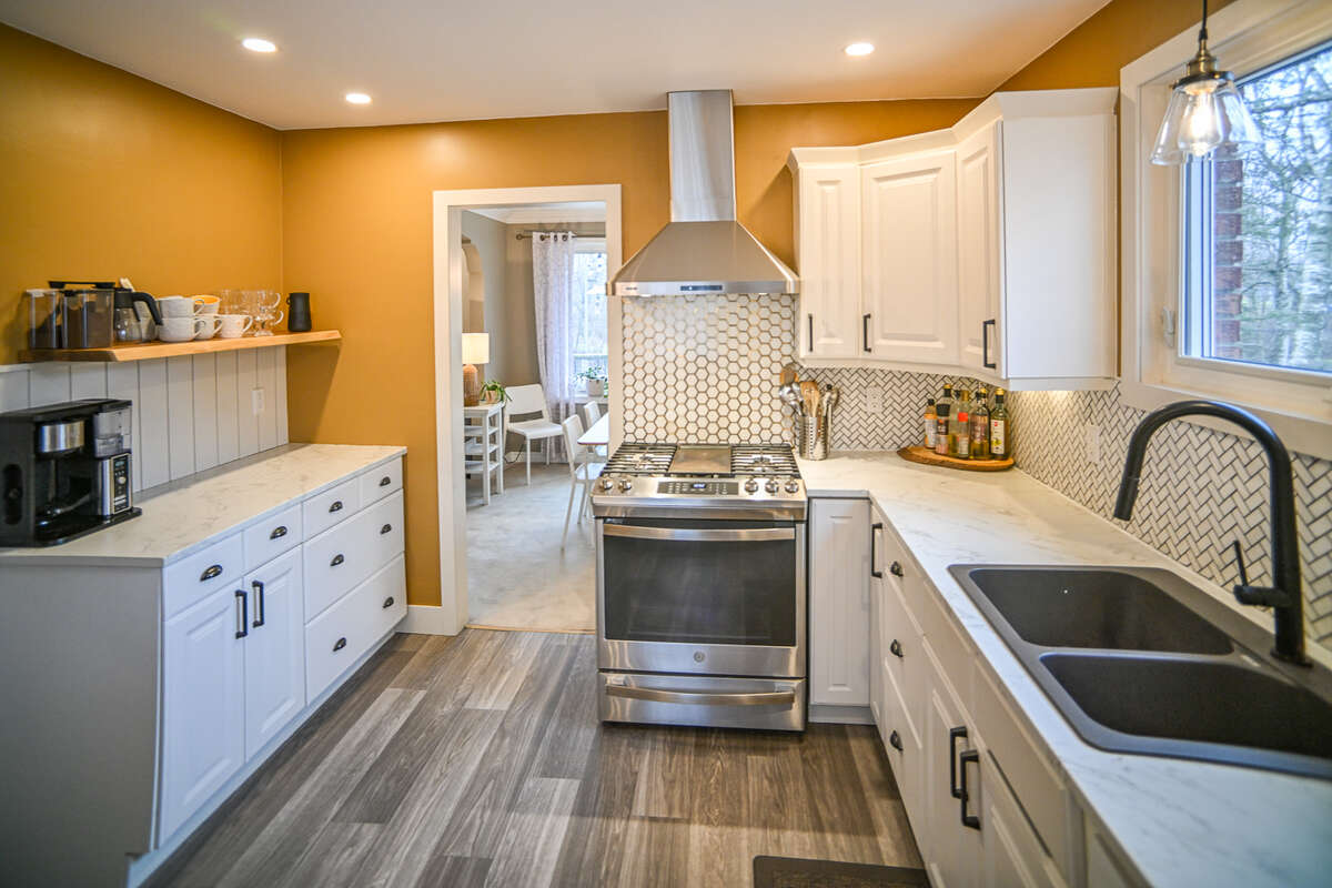 Gas stove and stainless appliances included.