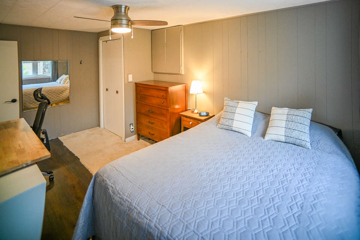 Updated 3pc lower bathroom with modern shower and rainhead showerheads.