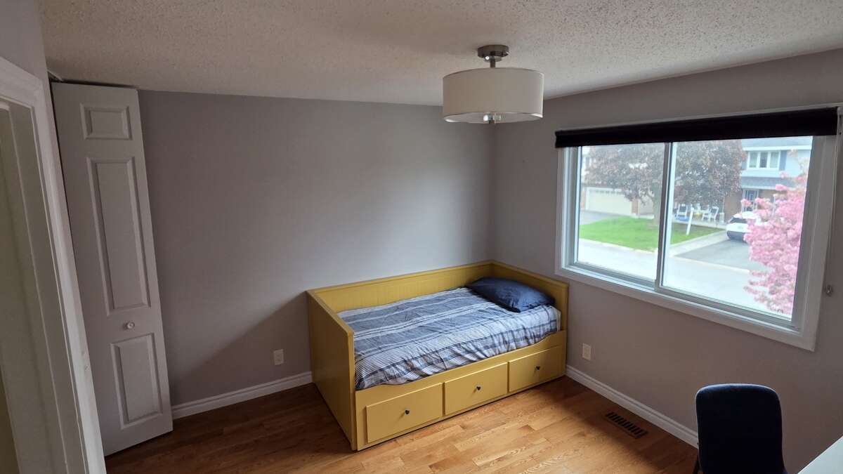 Bedroom with picturesque view of the cherry blossom tree