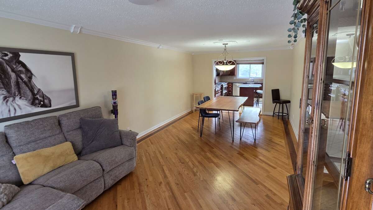 Versatile open layout with hardwood throughout