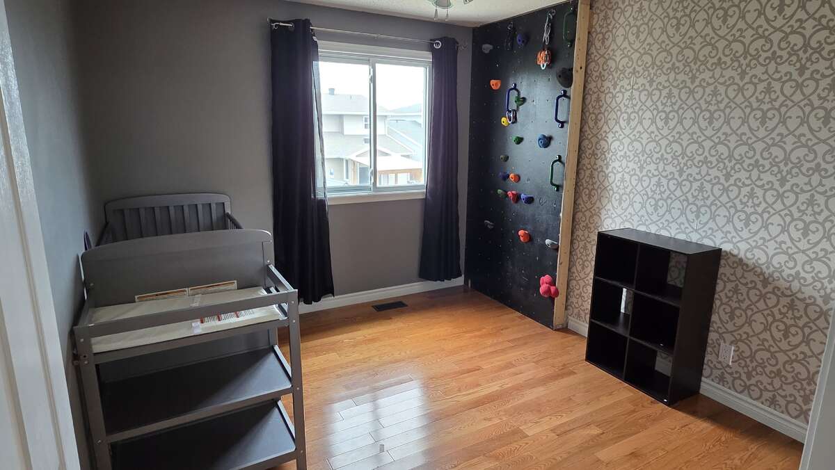 Playful child's bedroom with accent wall
