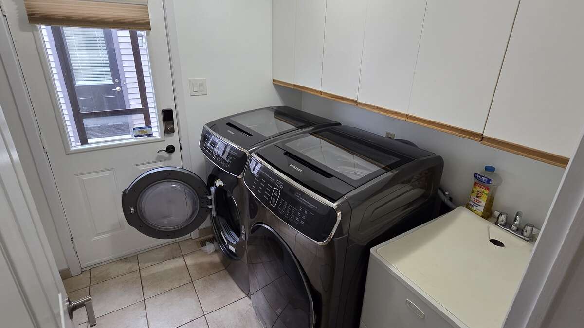 Functional laundry room with direct exterior access