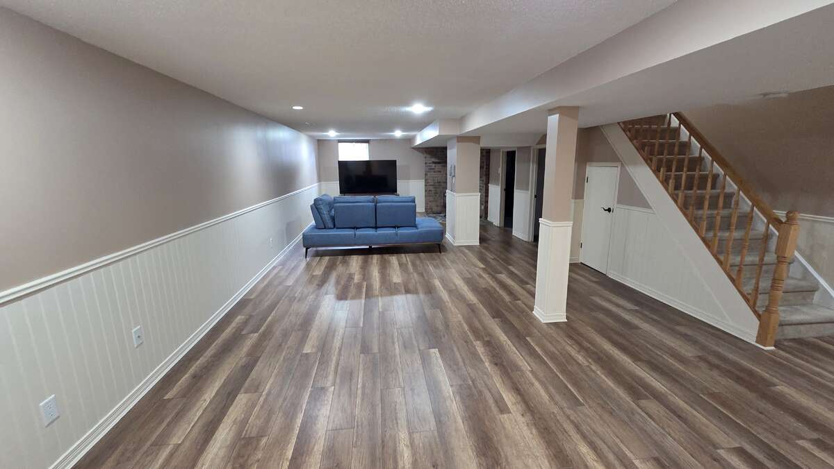 Open finished basement, endless possibilities for games or gym