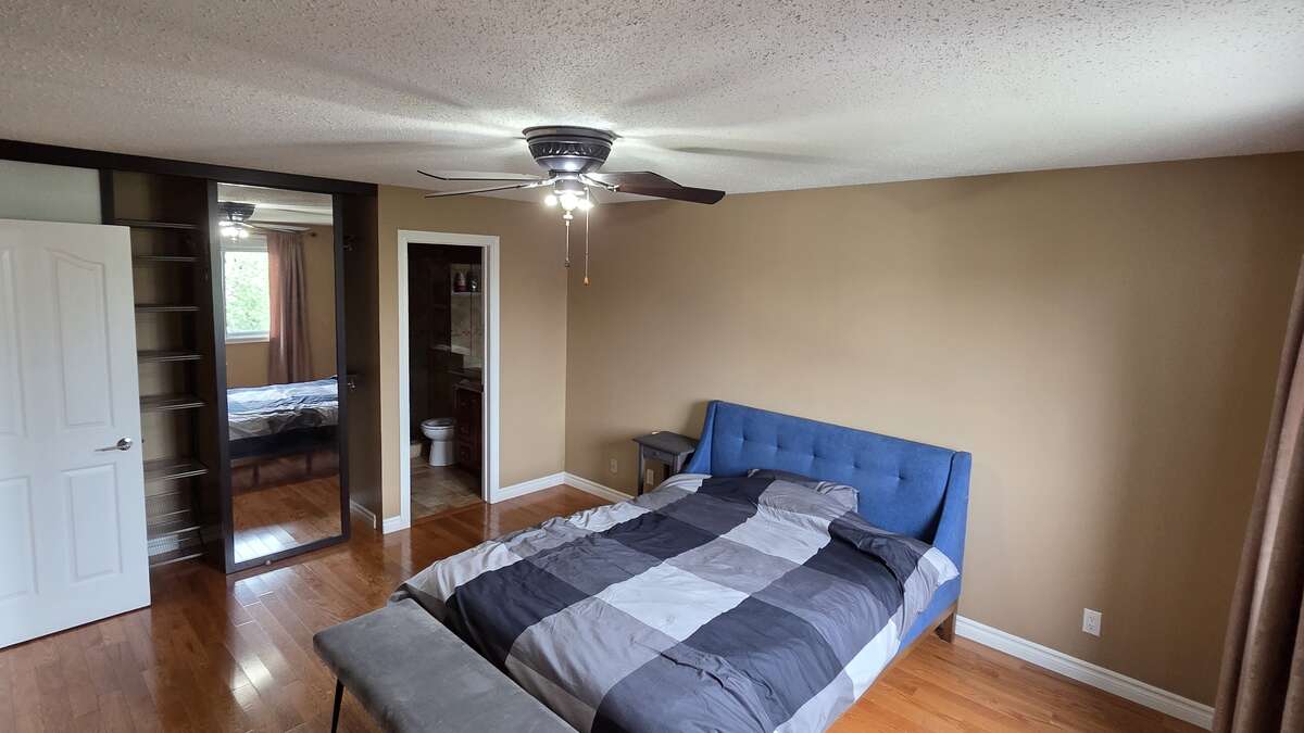 Bright primary suite with natural light and ample storage