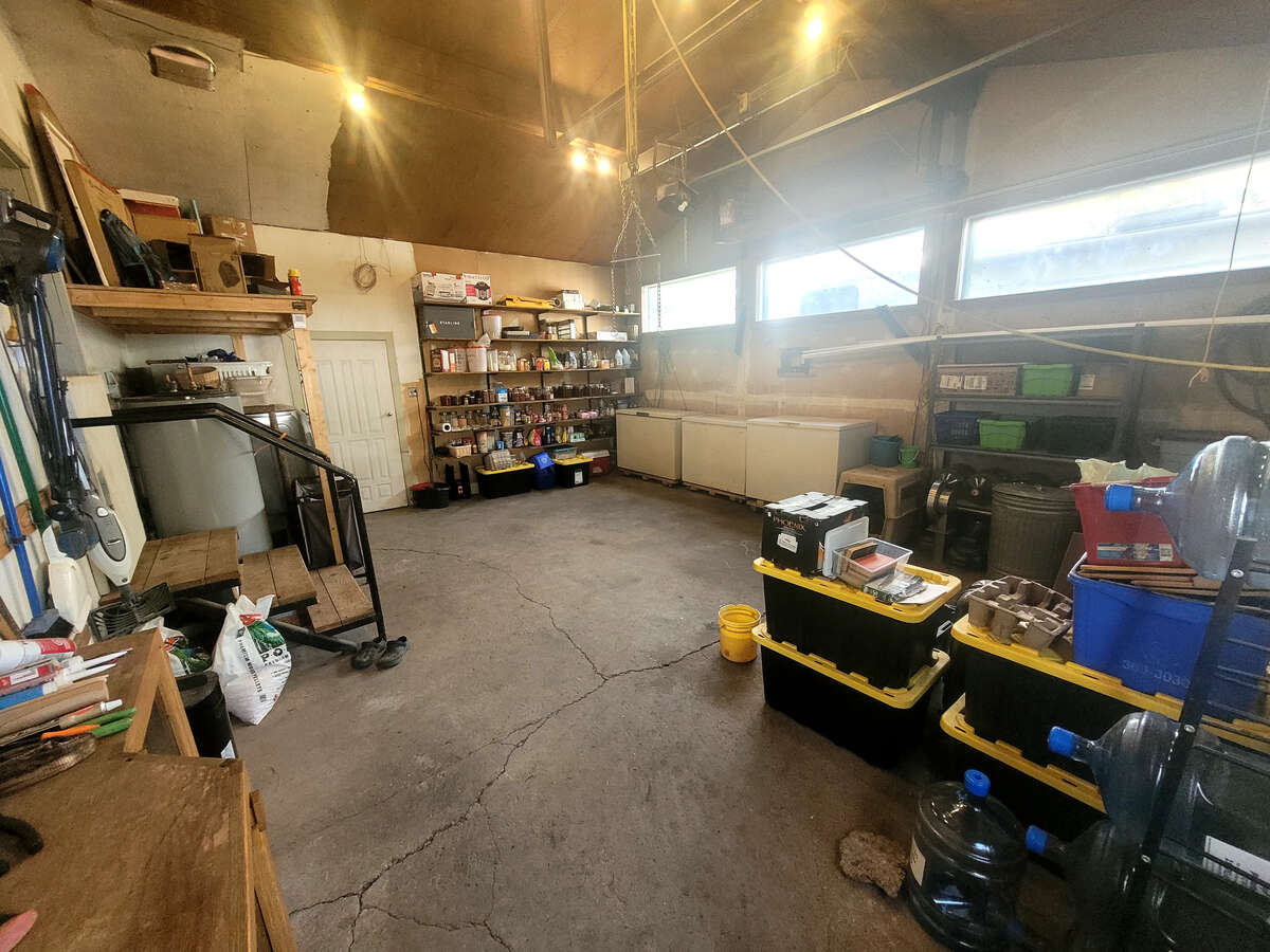 attached garage, concrete floors, big windows, storage