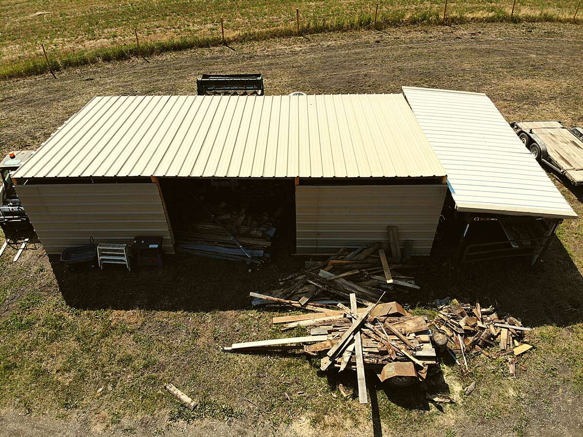 12x36 wood shed with covered storage on back and kindling building on right