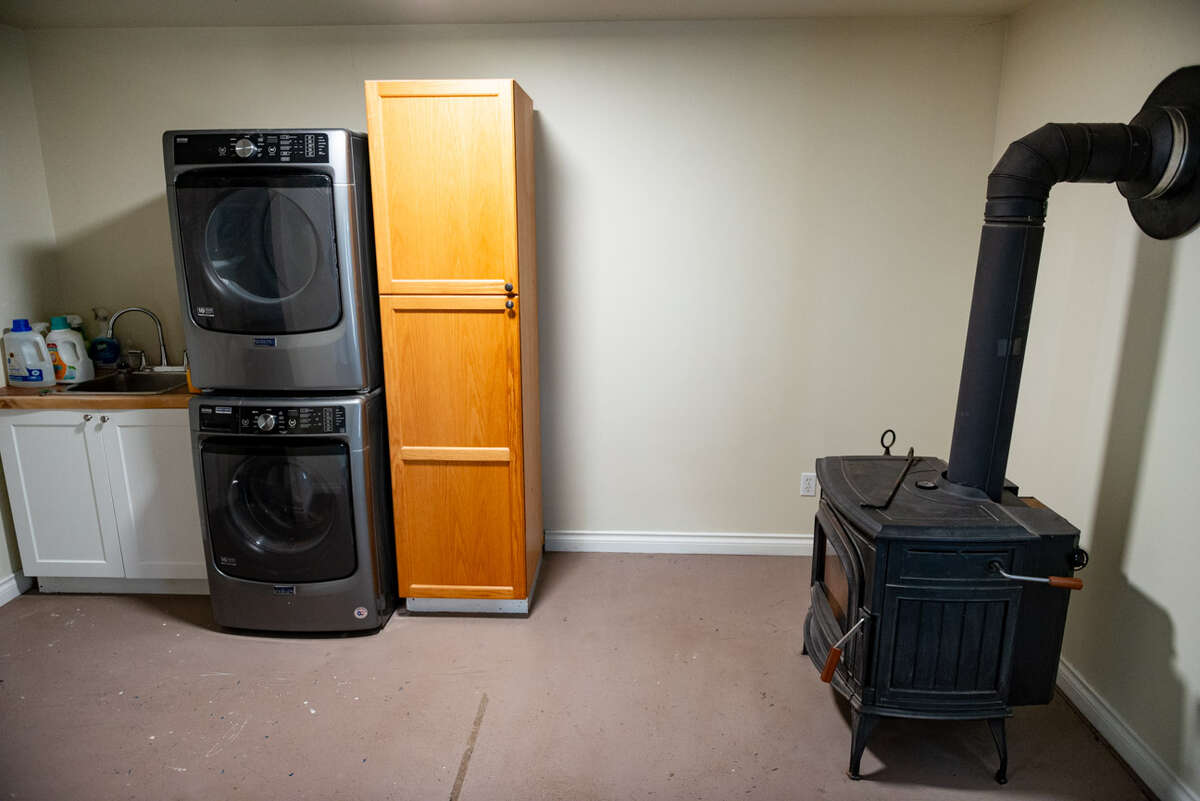 Blaze King Woodstove and shared laundry