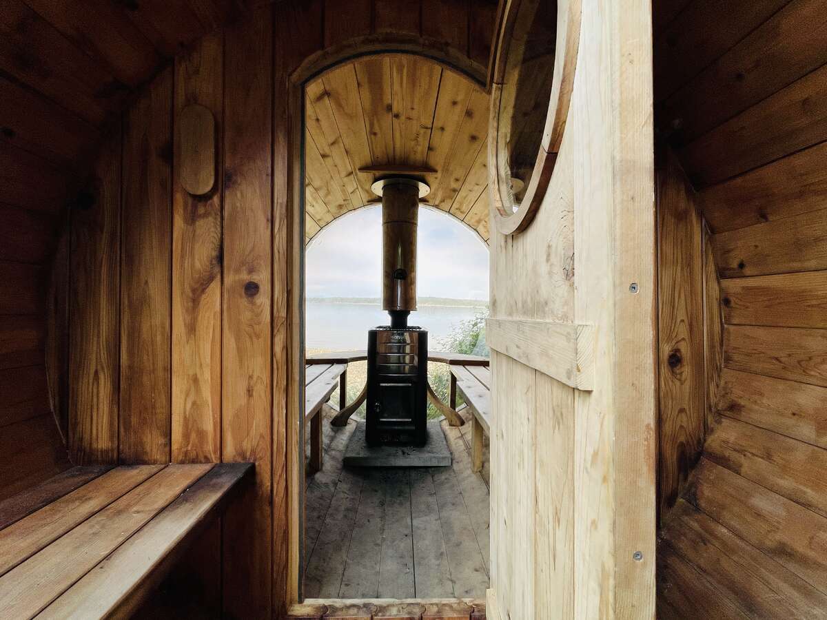 Full bubble, wood fired barrel sauna.