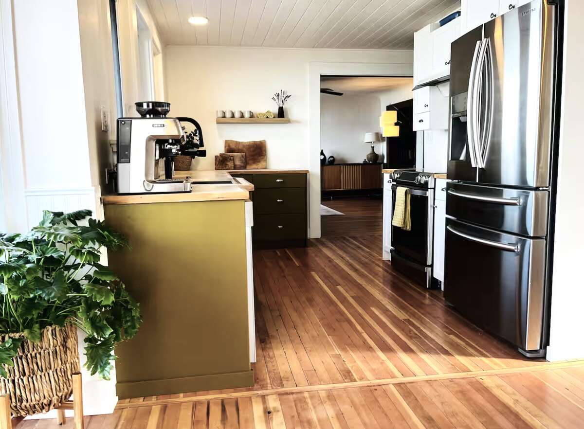 Kitchen with stunning original fir floors.