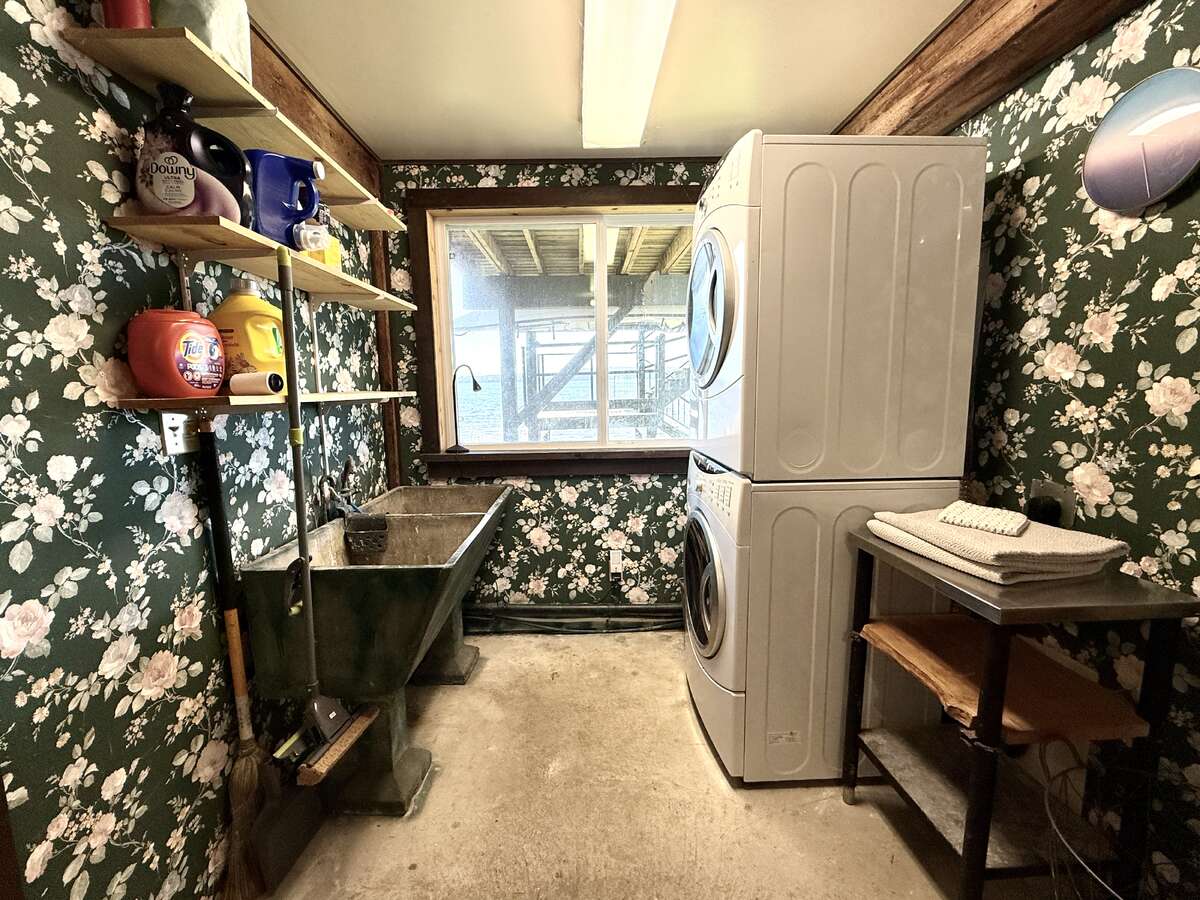 Laundry room with vintage sink.