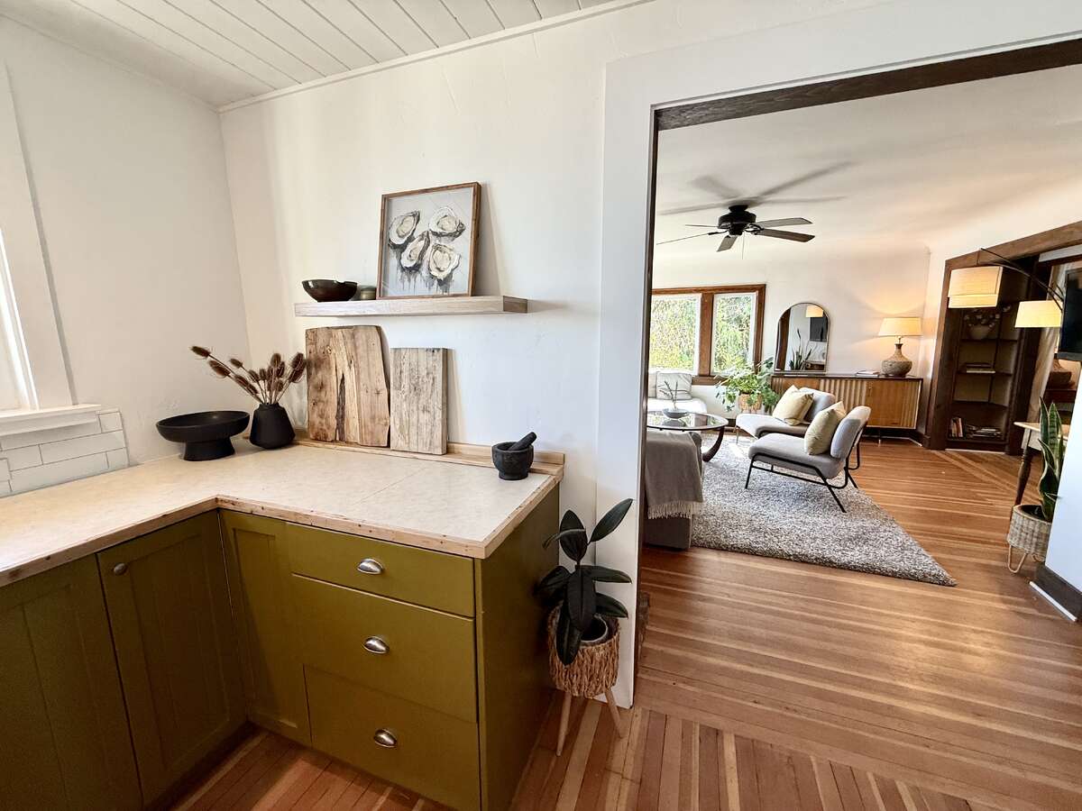 Kitchen through to living room.