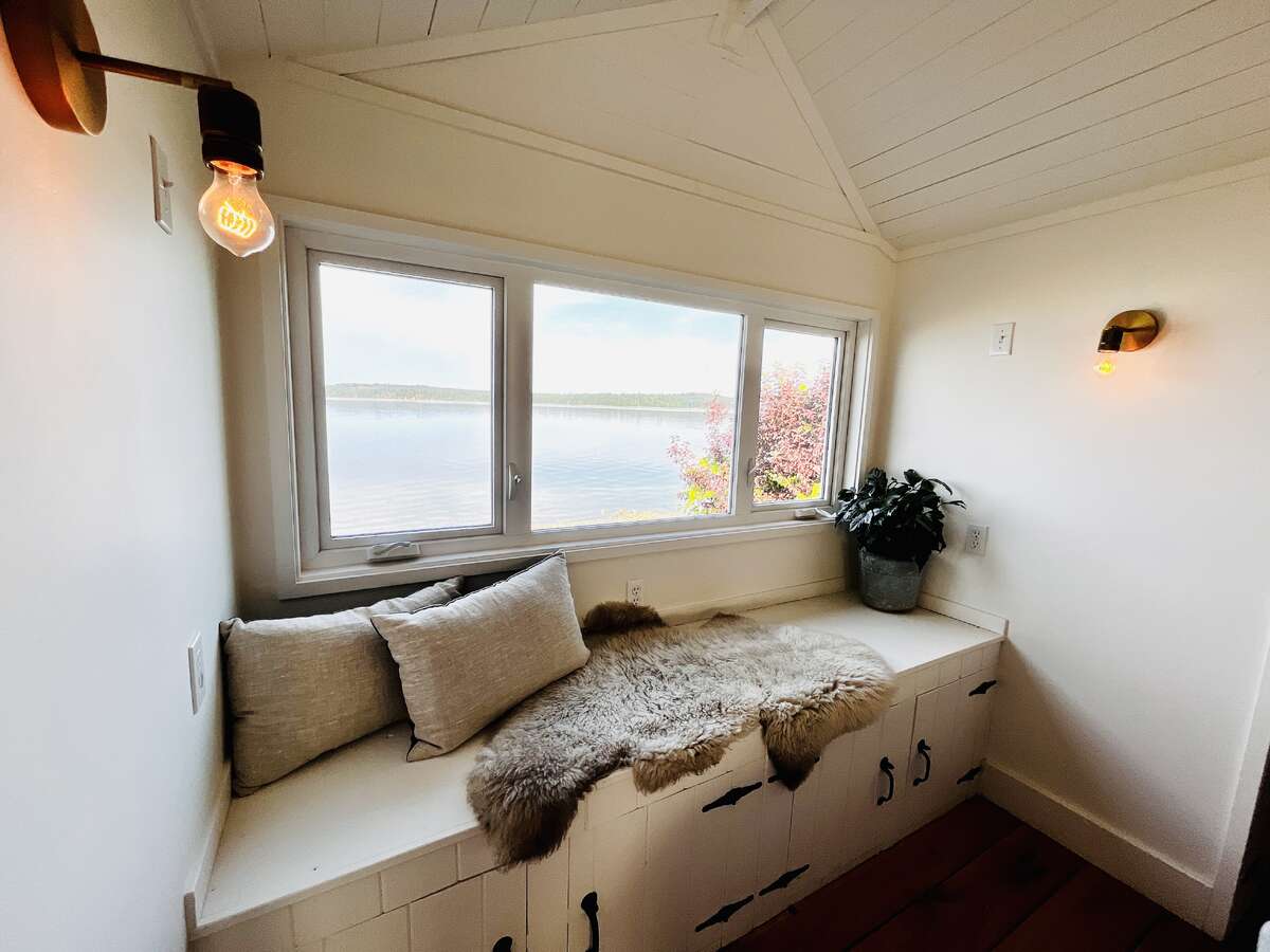 A sweet little built in bench with storage. Perfect for morning coffee.