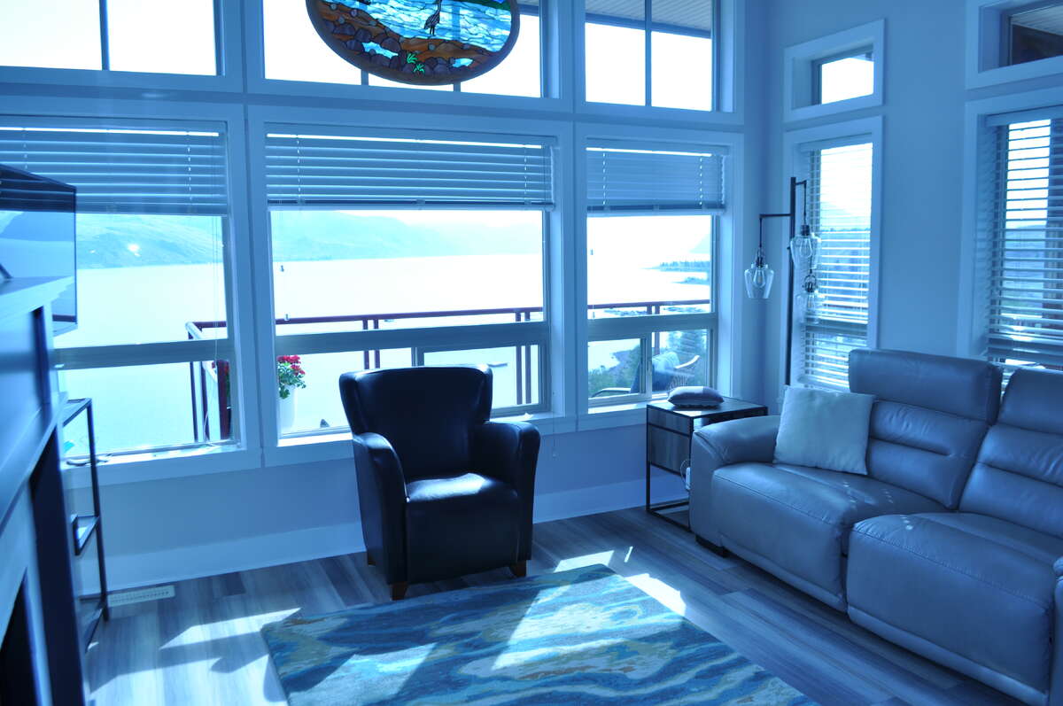 Living Room with a view of wrap around deck