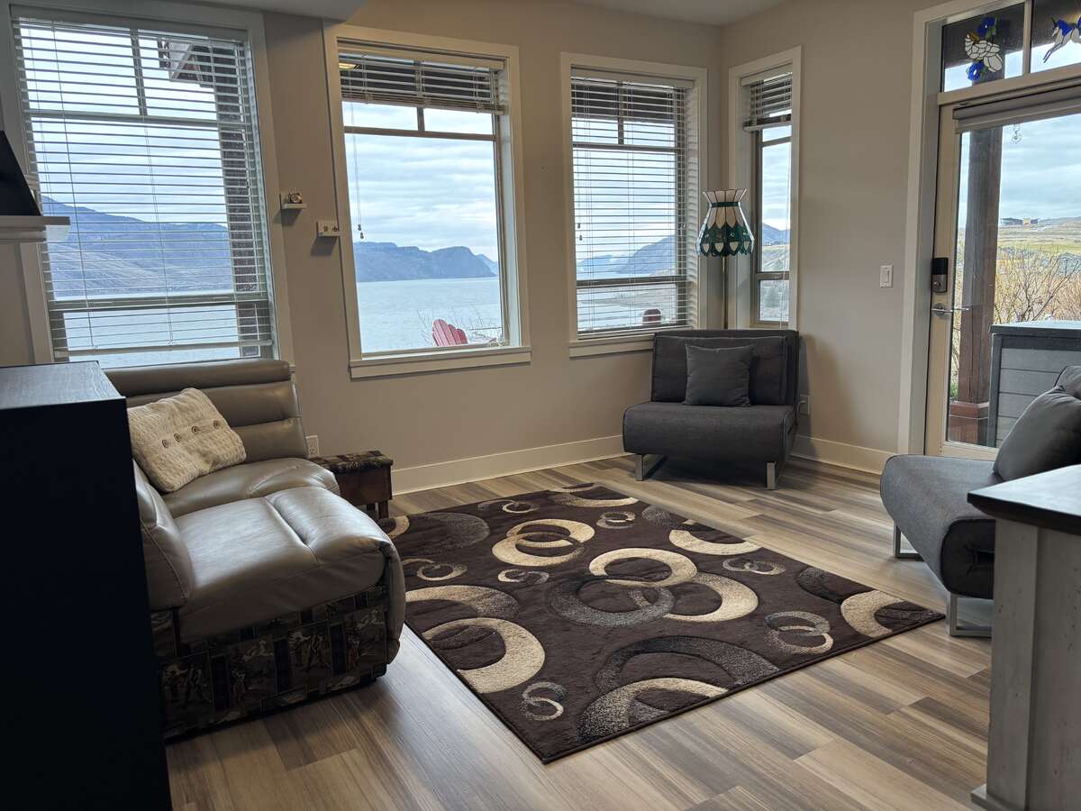 Bonus room to walk out covered, waterfront patio