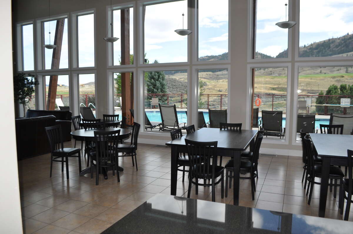 Club house pool and lake view.
