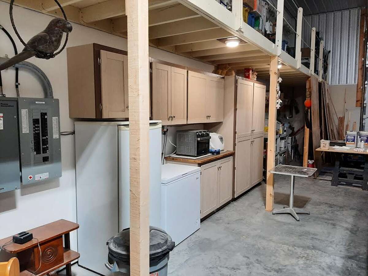 Additional kitchen pantry cupboard space..Plus extra fridge and freezer