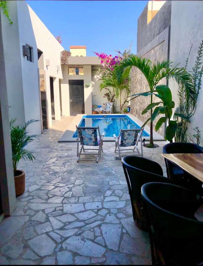 Pool view facing north and entrance