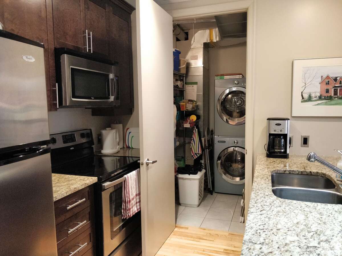 Extra storage and laundry area (with large capacity washer and dryer)