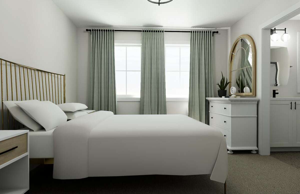 Spacious primary bedroom designed for privacy and comfort.