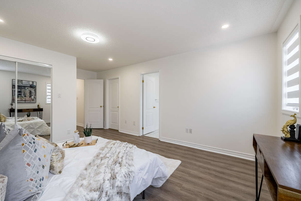 Master Bedroom with his and her closets