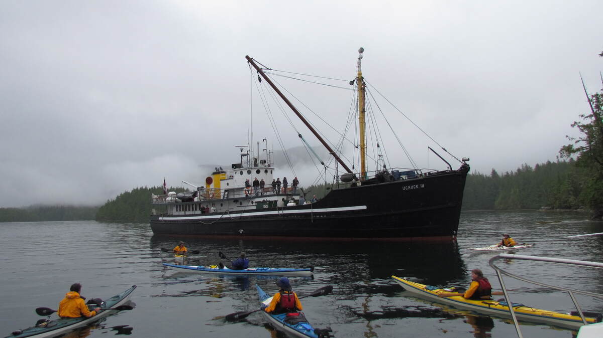 MV Uchuck picking up kayakers off dock