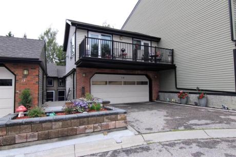 Townhouse For Sale in Calgary, AB - 1+3 bdrm, 4 bath (14, 448 Strathcona Drive SW)