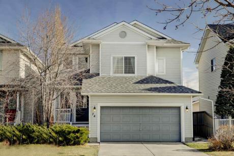 Revenue Property / Detached House For Sale in Calgary, AB - 4 bdrm, 4 bath (74 Bridleridge Way Southwest)
