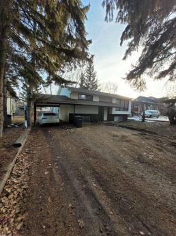 Revenue Property / Bungalow / Home with Unregistered Suite For Sale in Sylvan Lake, AB - 2+2 bdrm, 2 bath (4415 48 Ave)