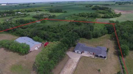 Land with Building(s) / Acreage / Golf Course View / Home-Based Business Potential / House For Sale in Gladstone, MB - 4 bdrm, 2.5 bath (80043 Hwy 34)