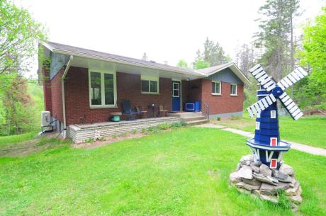 House / Acreage / Bungalow For Sale in North Bay, ON - 3+1 bdrm, 2 bath (5585 Hwy 63)