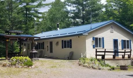 Cottage / Bungalow / Island / Waterfront Property For Sale in Buckhorn, ON - 3+2 bdrm, 2 bath (54 Fire Route 15)
